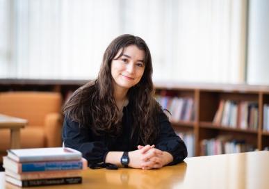 Zoe Kaufmann at a library desk